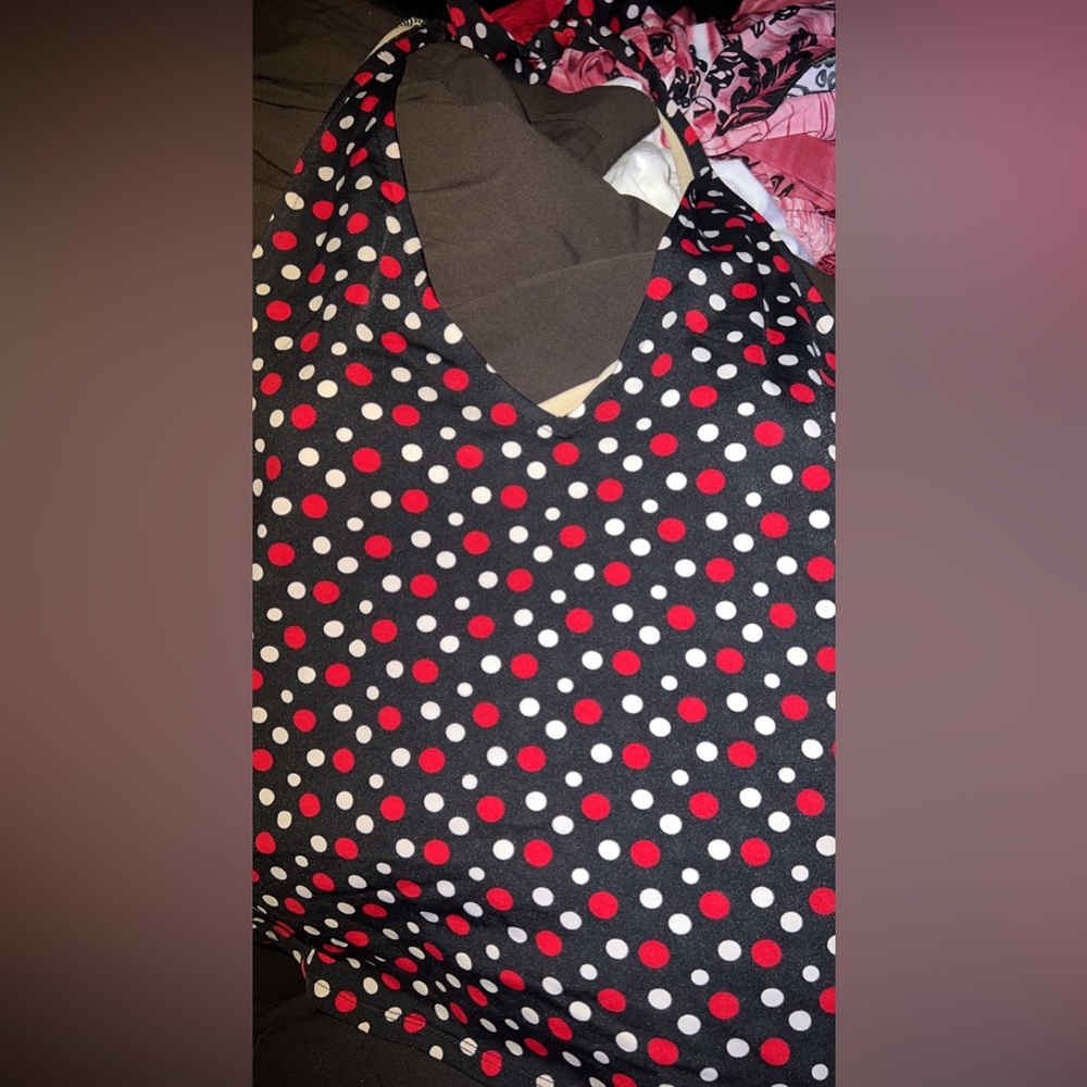 Just swim suit top. Black with red and white polka dots